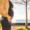 Pregnant woman outside, the health benefits of folate
